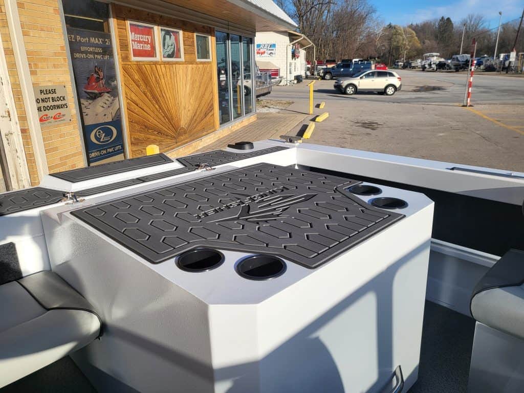 Boat deck with cup holders and non-slip surface at Camp and Cruise.