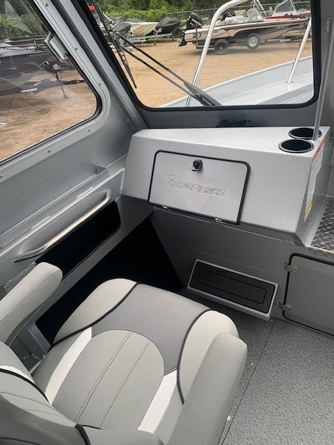 Close-up of boat's helm and seating area in KingFisher 2225 Escape HT.
