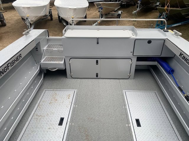 Interior view of KingFisher 2225 Escape HT fishing boat with storage and deck features.