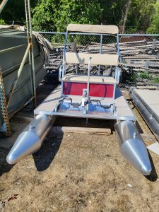 Paddle King PK3000 pontoon boat with canopy and dual pontoons.