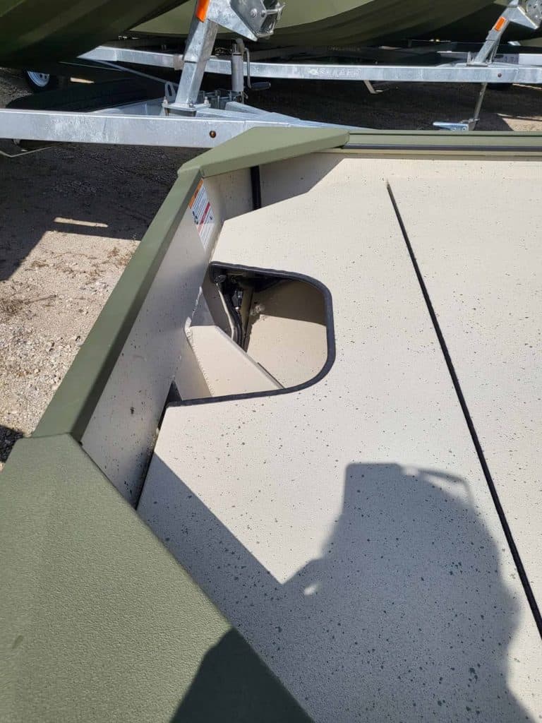 Close-up of boat transom showing mounting area and hull details.