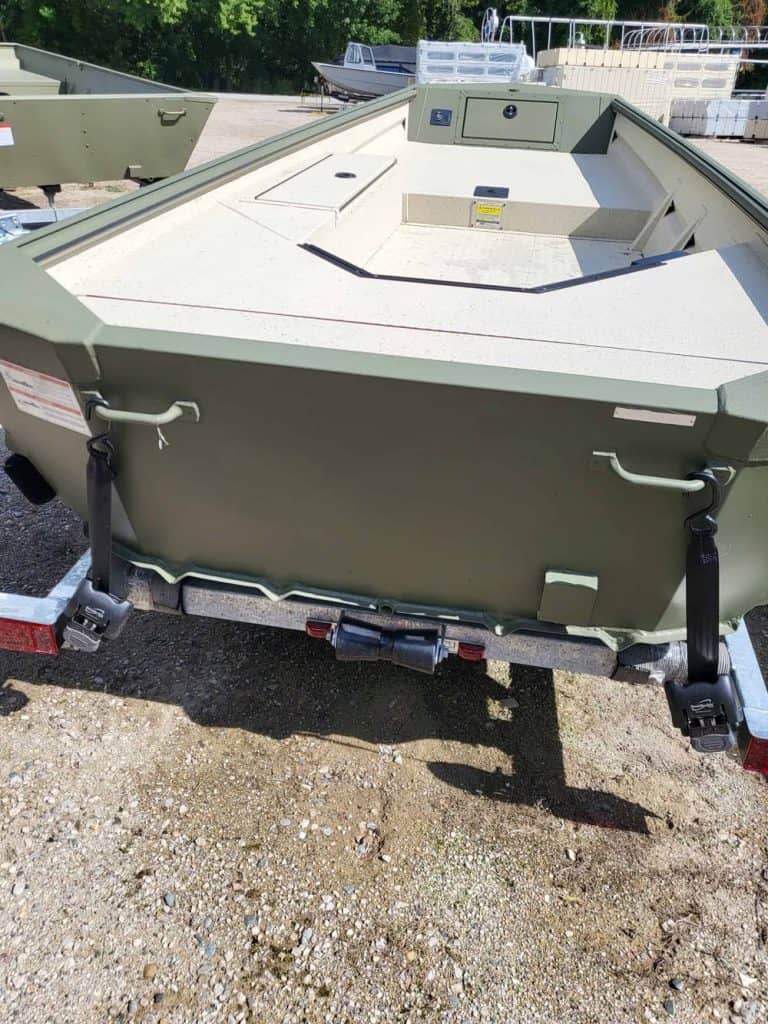 View of the transom of a SeaArk 1548-DXS DKLD 20 boat on trailer.