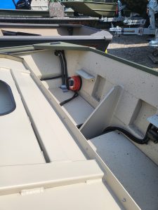 Close-up of boat electrical system featuring wiring and components at Camp & Cruise, emphasizing marine tech and durability.