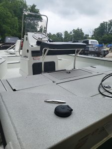Boat helm and dashboard of SeaArk BayRunner Tunnel 210 model.