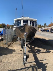 Front view of a boat on trailer at Camp and Cruise.