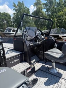 High-quality boat control dashboard with steering wheel and navigation features for sale at Camp & Cruise.