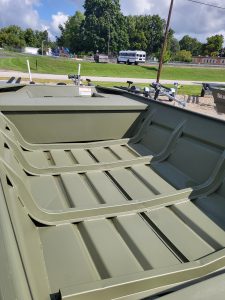 Reliable fishing boat available at Camp & Cruise for outdoor enthusiasts. Perfect for tranquil lake days.