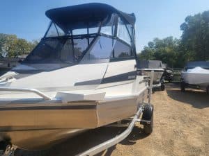 Marina boat with durable construction, ideal for fishing and recreational outings.