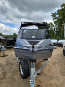 Fast and sporty boat on trailer ready for water adventures at Camp & Cruise.