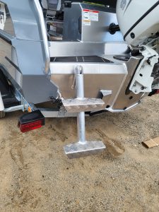 Close-up of an aluminum boat with stepping platform at Camp & Cruise. Perfect for fishing, boating, and outdoor adventures.