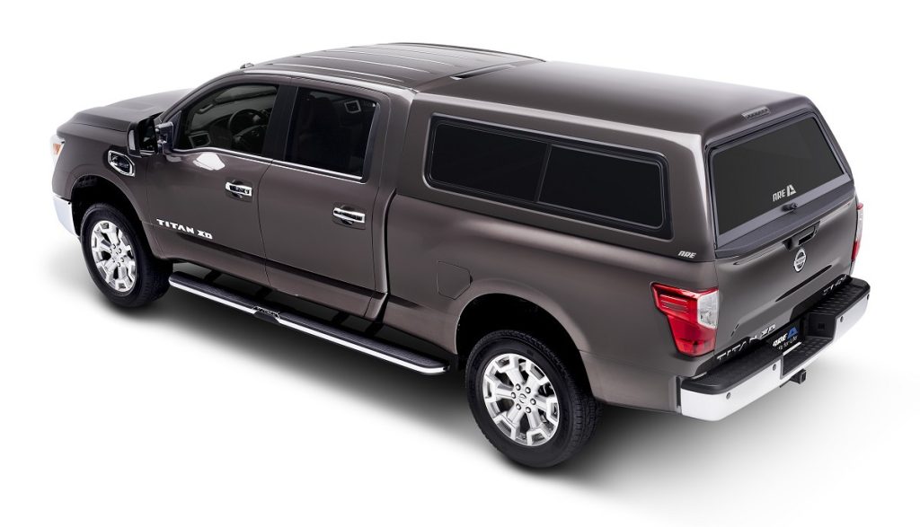 Reliable Titan XD with camper shell available at Camp & Cruise, offering versatile vehicle options.