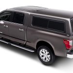 Reliable Titan XD with camper shell available at Camp & Cruise, offering versatile vehicle options.