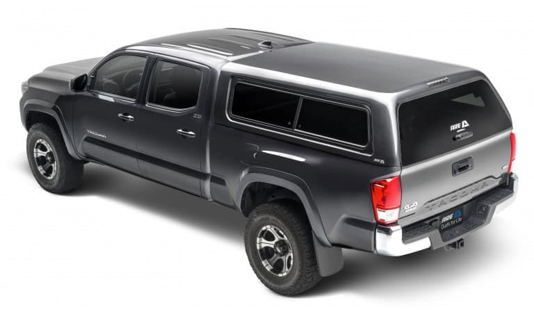 Durable truck bed cap for sale at Camp & Cruise, compatible with various pickup trucks, perfect for outdoor and work needs.