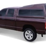 Ram 1500 vehicle with camper shell, ideal for outdoor adventure and utility conversion, available at Camp & Cruise.