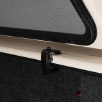 Close-up of a window screen clip at Camp & Cruise sporting venue.