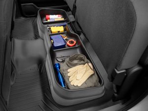 Organized vehicle storage with tools and supplies for roadside emergencies.