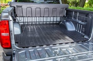 Durable truck bed liner protects against damage and enhances load security. Perfect for trucks used in sports and outdoor activities.