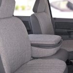 Interior view of a spacious vehicle with plush fabric seats, ideal for family and group travel.