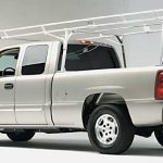 Utility pickup truck with roof rack at Camp & Cruise.