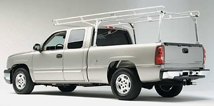 Utility pickup truck with roof rack at Camp & Cruise.