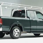 Durable Ford work truck with ladder rack at Camp & Cruise.