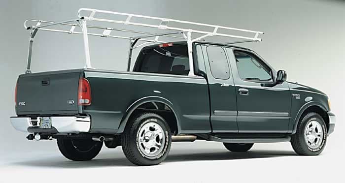 Durable Ford work truck with ladder rack at Camp & Cruise.