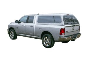 High-quality silver Ram 1500 truck with camper shell for outdoor adventures and cargo needs.