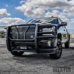 Durable black truck grille guard for added vehicle protection.
