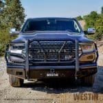 Durable front grille with Westin bumper and HDX Bandit grille guard.