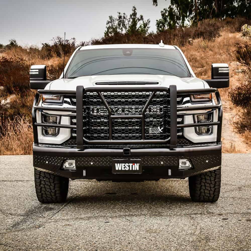 Police SUV with front bumper guard in outdoor setting.