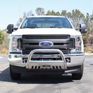 Front view of a white Ford pickup truck with a chrome bumper guard, showcasing durable vehicles.