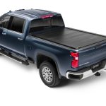 Versatile truck bed cover for trucks at Camp & Cruise, ideal for outdoor sports gear.