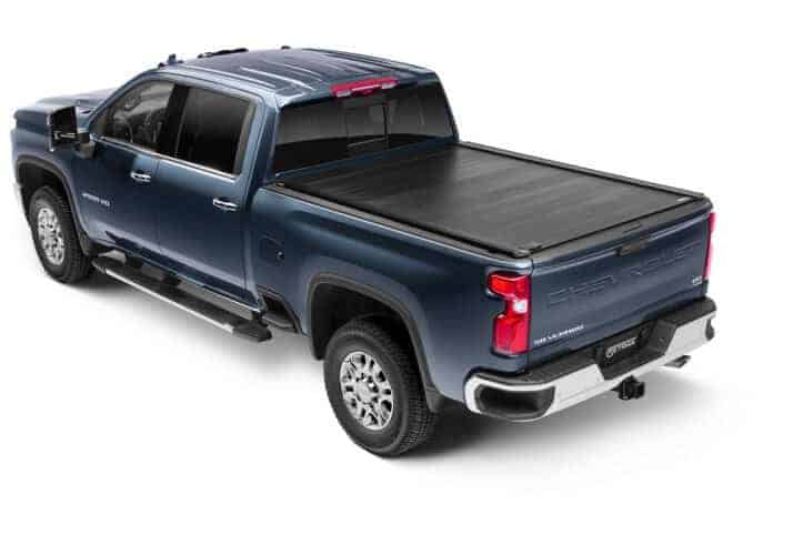 Versatile truck bed cover for trucks at Camp & Cruise, ideal for outdoor sports gear.
