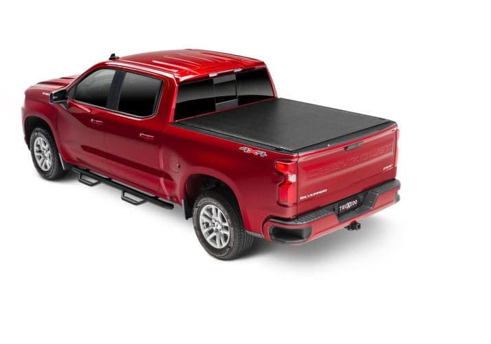 Truck bed cover for Toyota Tundra, durable and secure truck accessories.