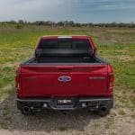 Ford F-150 Red Pickup Truck at Camp & Cruise for Sale or Service.