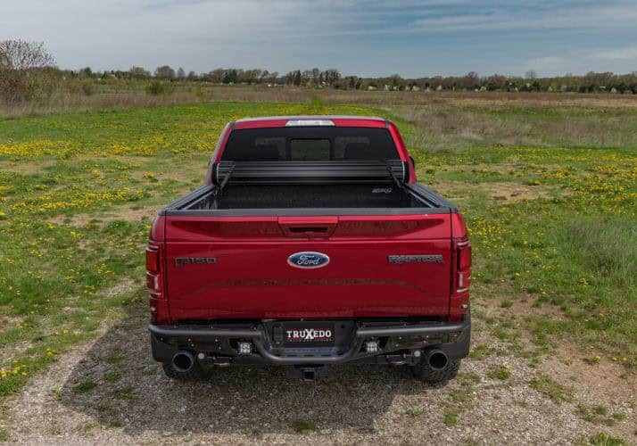 Ford F-150 Red Pickup Truck at Camp & Cruise for Sale or Service.