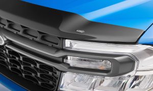 High-performance Husky truck grille in vibrant blue at Camp & Cruise.
