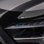 Close-up of advanced LED headlights on a modern vehicle at Camp & Cruise.