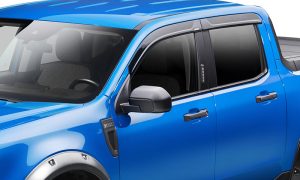 Blue pickup truck for sale at Hall’s Sport Center, featuring stylish design and reliable performance.