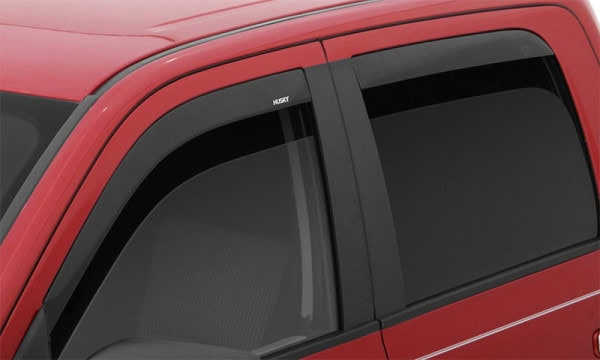 Close-up of car window tinting at Camp & Cruise, enhancing vehicle privacy and style.