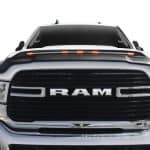Ram truck with bold grille and headlights showcase durability and performance.