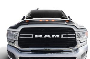 Ram truck with bold grille and headlights showcase durability and performance.