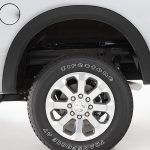 All-terrain tires and rugged vehicle features at Camp & Cruise.