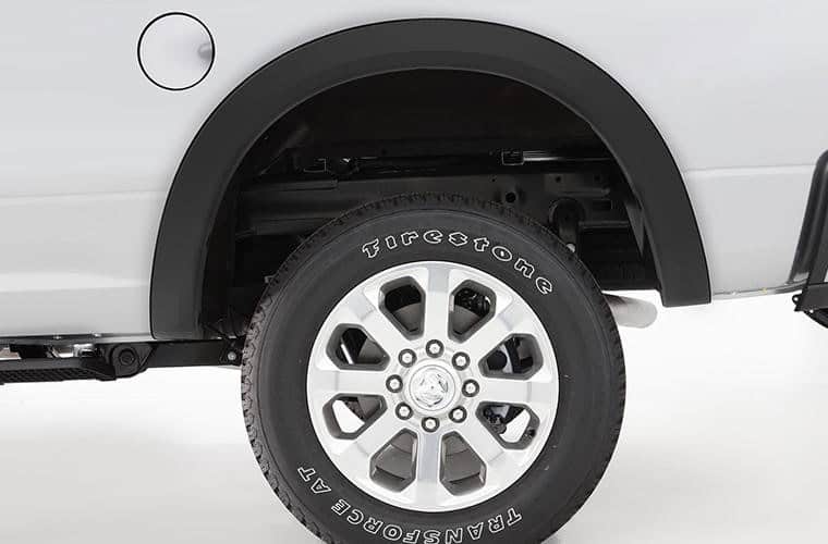 All-terrain tires and rugged vehicle features at Camp & Cruise.