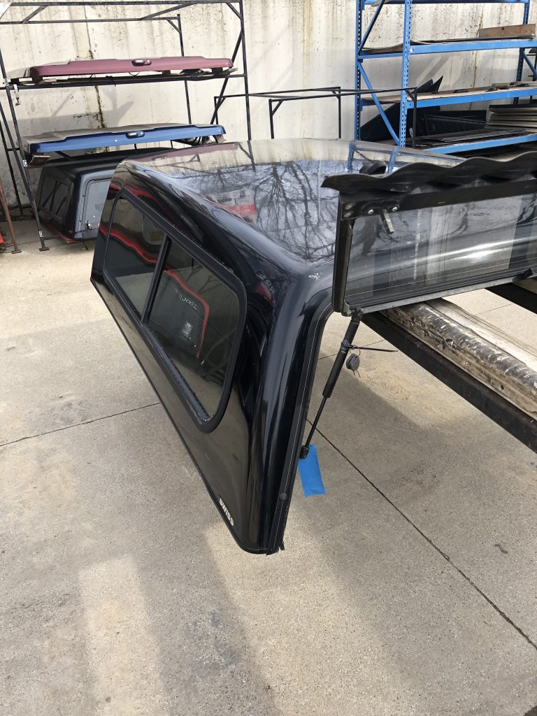 Truck cap for sale at Camp & Cruise, providing high-quality, weather-resistant coverage for trucks, ideal for outdoor and camping needs.