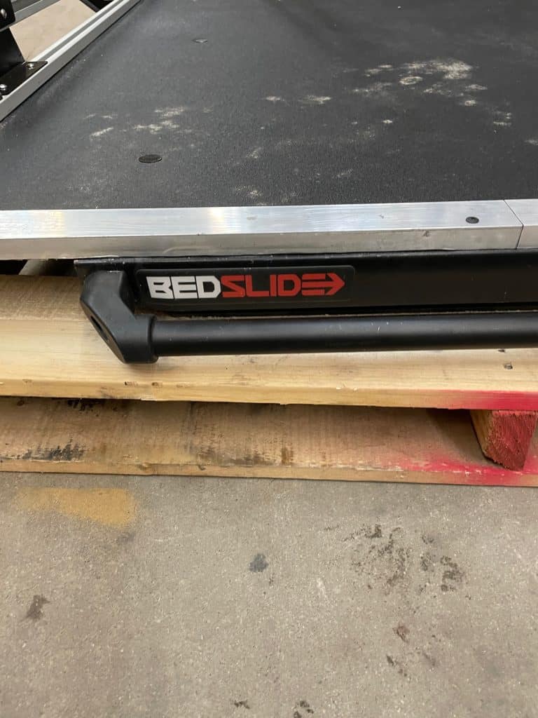 Durable bed slide tray for convenient vehicle storage solutions. Perfect for trucks and RVs, enhancing organization and accessibility.