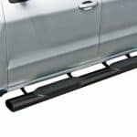 Durable black truck running boards for easy vehicle access.