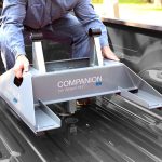 Efficient trailer hitch installation on pickup truck bed for towing and hauling needs.