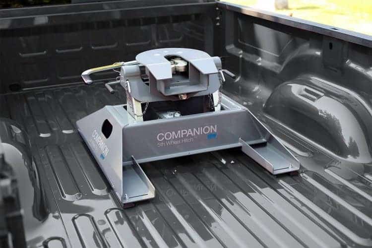 Heavy-duty trailer hitch for trucks at Camp & Cruise. Perfect for towing and hauling needs.