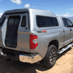 High-quality off-road truck with Camper canopy for outdoor use.